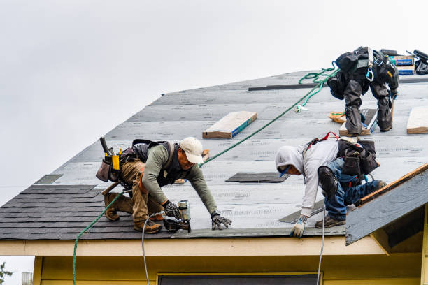 Professional Roofing technician working in Madison, NH